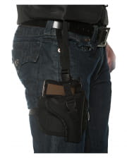 Pistol holster with adjustable strap 