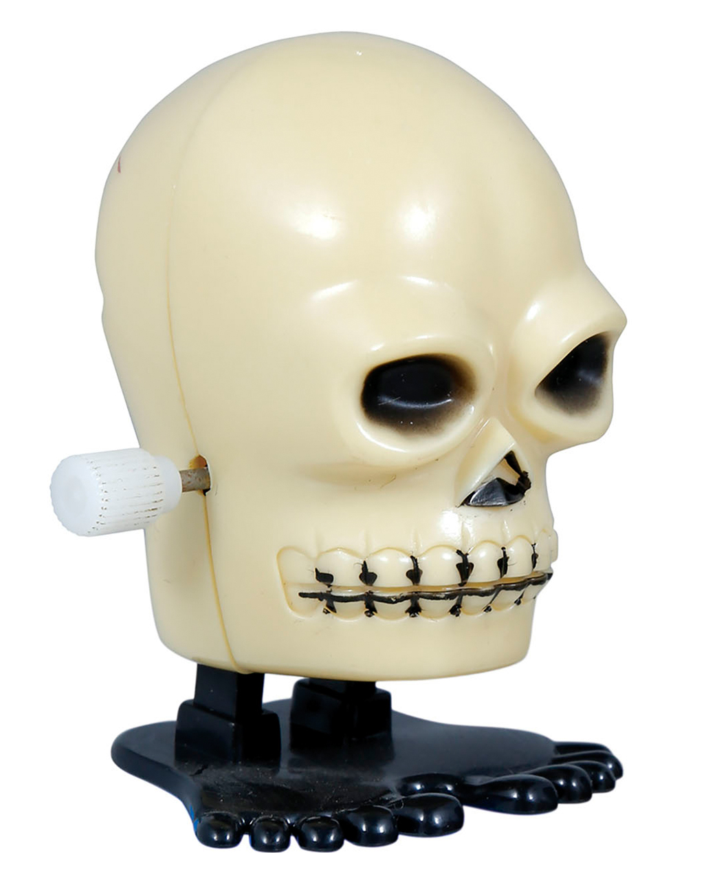 Skull To Wind Up 5cm | Halloween wind up skull | Horror-Shop.com